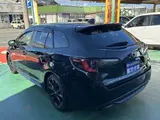 2025 Toyota Corolla Touring 1.8 Hybrid Active Sport, Genuine Navigation System, LED Headlights Black Van for sale, Japanese used car export - photo 2 of 24 | GULJI TRADERS