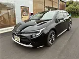 2025 Toyota Corolla Touring Hybrid Double WxB 4WD Black Van for sale, Japanese used car export - photo 1 of 38 | GULJI TRADERS