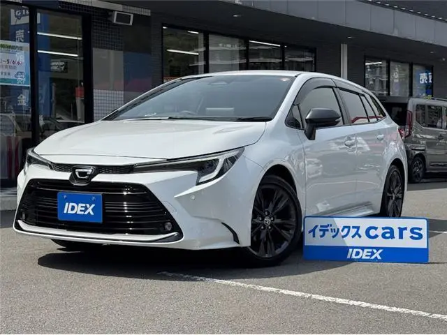 2025 Toyota Corolla Touring Hybrid WXB Pearl Van for sale, Japanese used car export | GULJI TRADERS