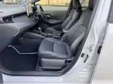 2025 Toyota Corolla Touring Hybrid WXB Pearl Van for sale, Japanese used car export - photo 3 of 34 | GULJI TRADERS