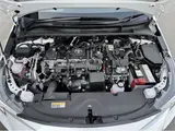 2025 Toyota Corolla Touring Hybrid WXB Pearl Van for sale, Japanese used car export - photo 14 of 34 | GULJI TRADERS