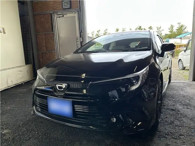 2025 Toyota Corolla Touring Hybrid Active Sports 4WD - photo 1 2025 Toyota Corolla Touring Hybrid Active Sports 4WD Black Van for sale, Japanese used car export - photo 1 of 13 | GULJI TRADERS