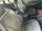 2025 Toyota Corolla Touring Hybrid Active Sports 4WD Black Van for sale, Japanese used car export - photo 10 of 13 | GULJI TRADERS