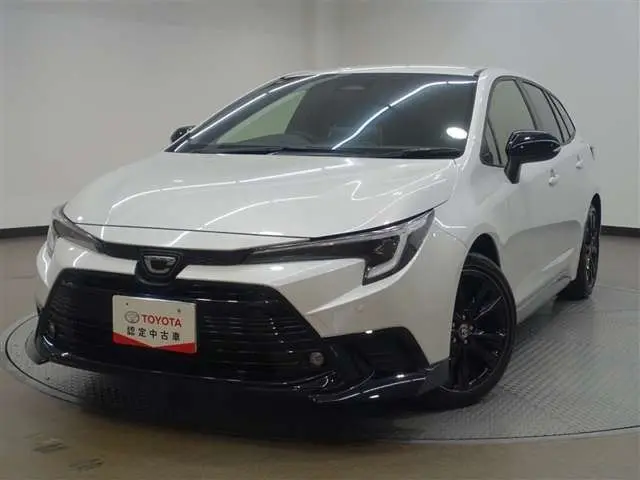 2025 Toyota Corolla Touring 1.8 Hybrid Active Sport White Van for sale, Japanese used car export | GULJI TRADERS