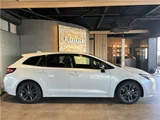 2025 Toyota Corolla Touring Hybrid WXB Van for sale, Japanese used car export - photo 7 of 50 | GULJI TRADERS