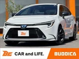 2025 Toyota Corolla Touring Hybrid Van for sale, Japanese used car export - photo 1 of 45 | GULJI TRADERS
