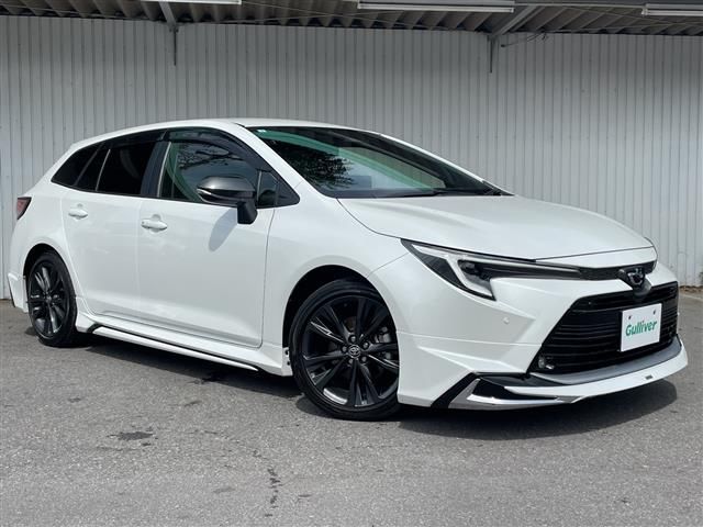 2025 Toyota Corolla Touring Hybrid 4WD Van for sale, Japanese used car export - photo 1 of 24 | GULJI TRADERS