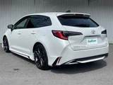 2025 Toyota Corolla Touring Hybrid 4WD Van for sale, Japanese used car export - photo 2 of 24 | GULJI TRADERS
