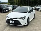 2025 Toyota Corolla Touring 1.8HV x pure 17AW White Van for sale, Japanese used car export - photo 11 of 30 | GULJI TRADERS