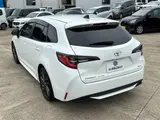 2025 Toyota Corolla Touring 1.8HV x pure 17AW White Van for sale, Japanese used car export - photo 13 of 30 | GULJI TRADERS