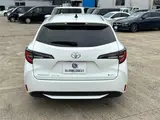 2025 Toyota Corolla Touring 1.8HV x pure 17AW White Van for sale, Japanese used car export - photo 14 of 30 | GULJI TRADERS