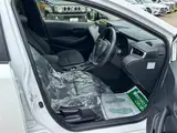 2025 Toyota Corolla Touring 1.8HV x pure 17AW White Van for sale, Japanese used car export - photo 18 of 30 | GULJI TRADERS