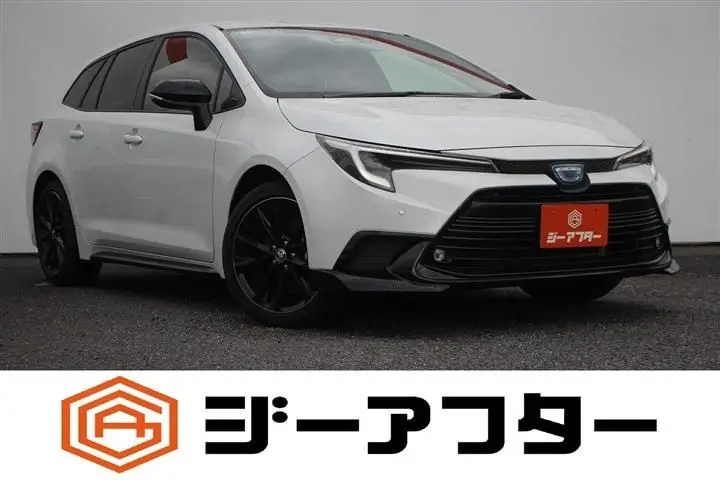 2025 Toyota Corolla Touring 1.8 HV ACTIVE SPORT - photo 1 2025 Toyota Corolla Touring 1.8 HV ACTIVE SPORT White Van for sale, Japanese used car export - photo 1 of 30 | GULJI TRADERS