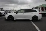 2025 Toyota Corolla Touring 1.8 HV ACTIVE SPORT White Van for sale, Japanese used car export - photo 13 of 30 | GULJI TRADERS