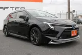 2025 Toyota Corolla Touring 1.8 HYBRID WxB Black Van for sale, Japanese used car export - photo 21 of 30 | GULJI TRADERS