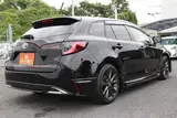 2025 Toyota Corolla Touring 1.8 HYBRID WxB Black Van for sale, Japanese used car export - photo 22 of 30 | GULJI TRADERS