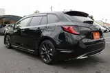 2025 Toyota Corolla Touring 1.8 HYBRID WxB Black Van for sale, Japanese used car export - photo 23 of 30 | GULJI TRADERS