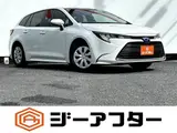 2025 Toyota Corolla Touring 1.8 HYBRID G White Van for sale, Japanese used car export - photo 1 of 20 | GULJI TRADERS