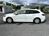 2025 Toyota Corolla Touring 1.8 HYBRID G White Van for sale, Japanese used car export - photo 10 of 20 | GULJI TRADERS