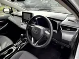 2025 Toyota Corolla Touring 1.8 HYBRID G White Van for sale, Japanese used car export - photo 13 of 20 | GULJI TRADERS