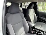 2025 Toyota Corolla Touring 1.8 HYBRID G White Van for sale, Japanese used car export - photo 14 of 20 | GULJI TRADERS