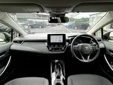 2025 Toyota Corolla Touring 1.8 HYBRID G White Van for sale, Japanese used car export - photo 17 of 20 | GULJI TRADERS