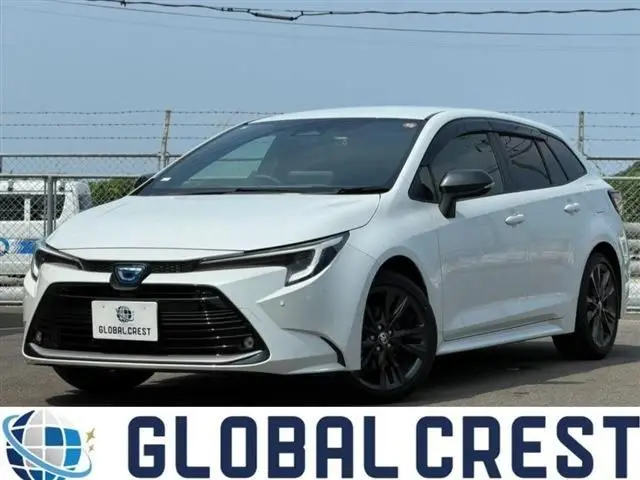 2025 Toyota Corolla Touring 1.8 HYBRID WxB White Van for sale, Japanese used car export | GULJI TRADERS