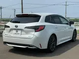 2025 Toyota Corolla Touring 1.8 HYBRID WxB White Van for sale, Japanese used car export - photo 6 of 30 | GULJI TRADERS