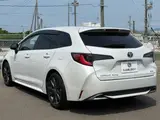 2025 Toyota Corolla Touring 1.8 HYBRID WxB White Van for sale, Japanese used car export - photo 8 of 30 | GULJI TRADERS