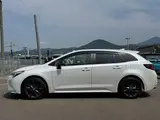 2025 Toyota Corolla Touring 1.8 HYBRID WxB White Van for sale, Japanese used car export - photo 9 of 30 | GULJI TRADERS