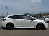2025 Toyota Corolla Touring 1.8 HYBRID WxB White Van for sale, Japanese used car export - photo 10 of 30 | GULJI TRADERS