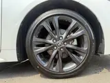 2025 Toyota Corolla Touring 1.8 HYBRID WxB White Van for sale, Japanese used car export - photo 11 of 30 | GULJI TRADERS