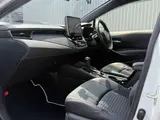 2025 Toyota Corolla Touring 1.8 HYBRID WxB White Van for sale, Japanese used car export - photo 12 of 30 | GULJI TRADERS