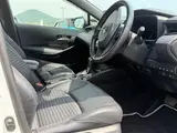 2025 Toyota Corolla Touring 1.8 HYBRID WxB White Van for sale, Japanese used car export - photo 13 of 30 | GULJI TRADERS