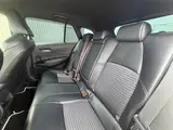 2025 Toyota Corolla Touring 1.8 HYBRID WxB White Van for sale, Japanese used car export - photo 15 of 30 | GULJI TRADERS