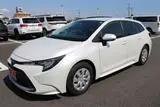 2025 Toyota Corolla Touring 1.8 HYBRID G Pearl Van for sale, Japanese used car export - photo 14 of 30 | GULJI TRADERS