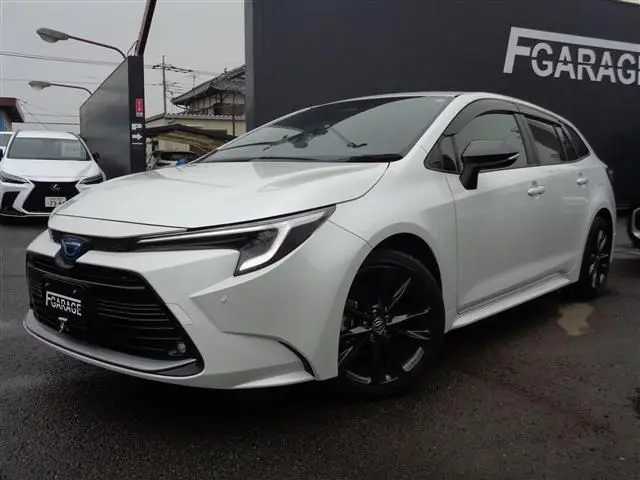 2025 Toyota Corolla Touring 1.8 HYBRID WxB Pearl Van for sale, Japanese used car export - photo 1 of 30 | GULJI TRADERS