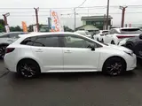 2025 Toyota Corolla Touring 1.8 HYBRID WxB Pearl Van for sale, Japanese used car export - photo 4 of 30 | GULJI TRADERS
