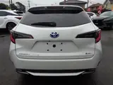 2025 Toyota Corolla Touring 1.8 HYBRID WxB Pearl Van for sale, Japanese used car export - photo 7 of 30 | GULJI TRADERS