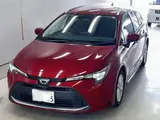2025 Toyota Corolla Touring G Red Van for sale, Japanese used car export - photo 1 of 3 | GULJI TRADERS