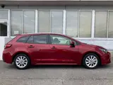 2025 Toyota Corolla Touring G Red Van for sale, Japanese used car export - photo 2 of 3 | GULJI TRADERS