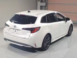 2025 Toyota Corolla Touring Hybrid Van for sale, Japanese used car export - photo 2 of 2 | GULJI TRADERS
