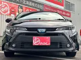 2025 Toyota Corolla Touring 1.8 Hybrid X E-Four 4WD Black Van for sale, Japanese used car export - photo 2 of 20 | GULJI TRADERS