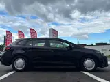2025 Toyota Corolla Touring 1.8 Hybrid X E-Four 4WD Black Van for sale, Japanese used car export - photo 4 of 20 | GULJI TRADERS