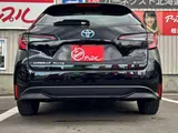 2025 Toyota Corolla Touring 1.8 Hybrid X E-Four 4WD Black Van for sale, Japanese used car export - photo 7 of 20 | GULJI TRADERS