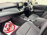 2025 Toyota Corolla Touring 1.8 Hybrid X E-Four 4WD Black Van for sale, Japanese used car export - photo 16 of 20 | GULJI TRADERS