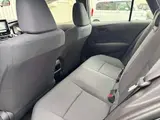 2025 Toyota Corolla Touring 1.8 Hybrid X E-Four 4WD Black Van for sale, Japanese used car export - photo 18 of 20 | GULJI TRADERS