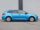 2025 Toyota Corolla Touring Hybrid G ​​Safety Sense Blue Van for sale, Japanese used car export - photo 4 of 9 | GULJI TRADERS