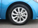 2025 Toyota Corolla Touring Hybrid G ​​Safety Sense Blue Van for sale, Japanese used car export - photo 9 of 9 | GULJI TRADERS