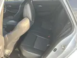 2025 Toyota Corolla Touring Hybrid Double By White Van for sale, Japanese used car export - photo 7 of 9 | GULJI TRADERS